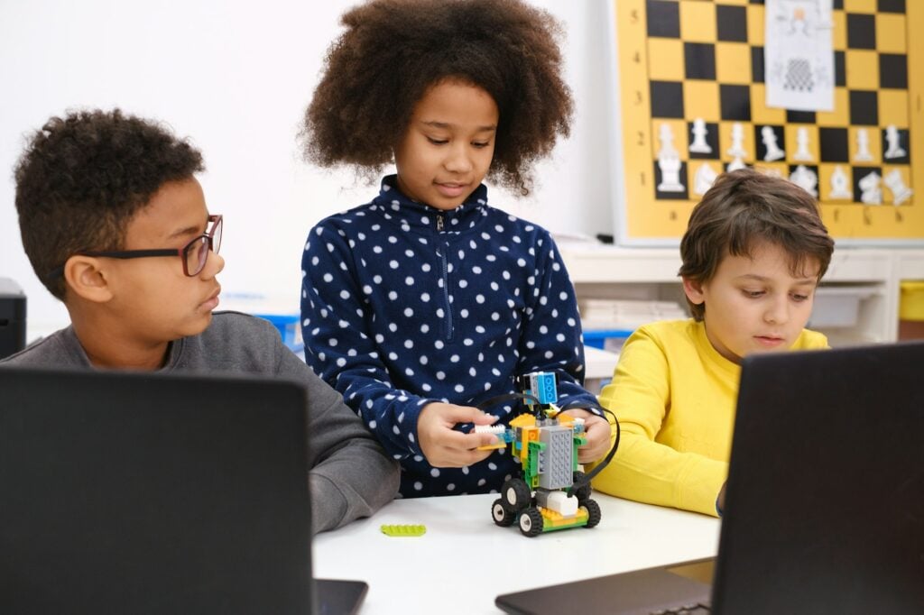 Diverse students in programming school learning to code